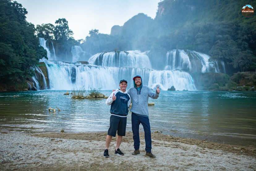 Visitor capturing a picture at Ban Gioc Waterfall, one of Vietnam’s most iconic natural sites.
